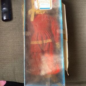 Porcelain Red Doll with Lace Trim